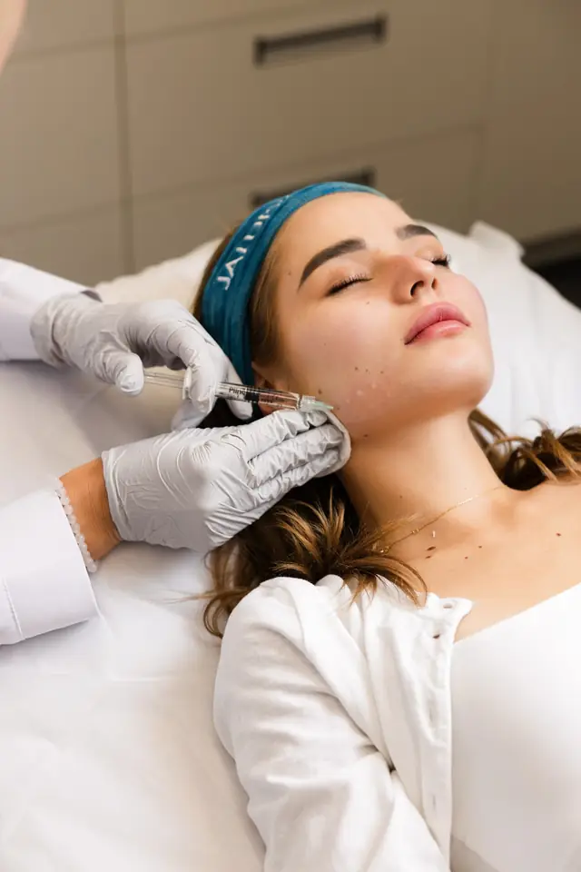 Client resting between steps of a facial