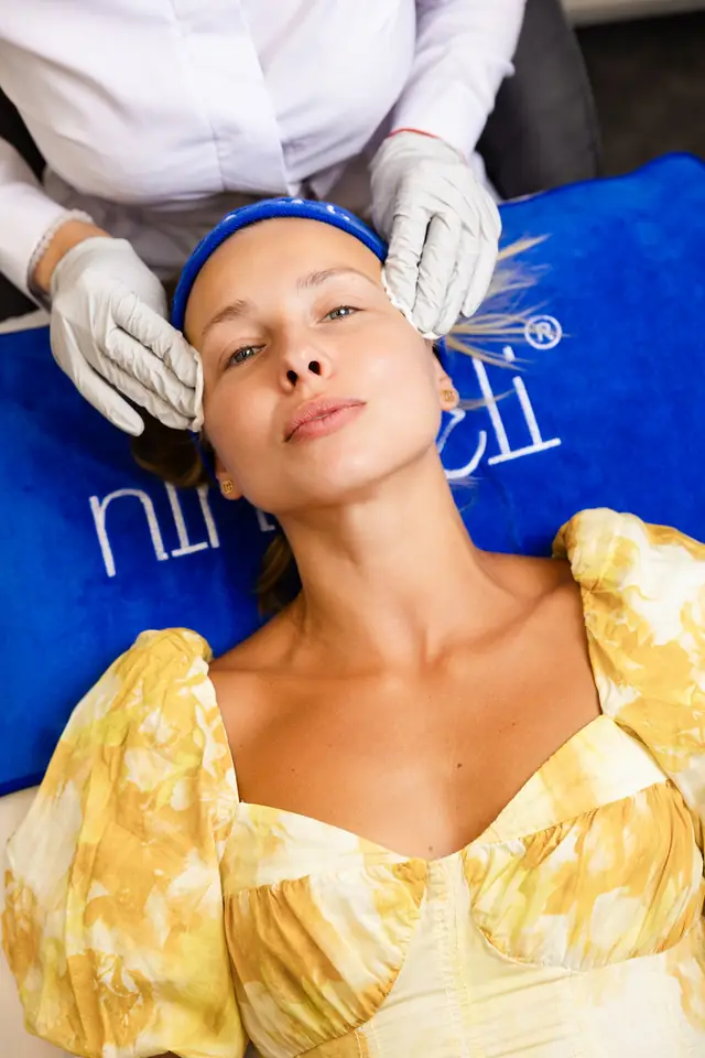 Talking with a client after a facial step